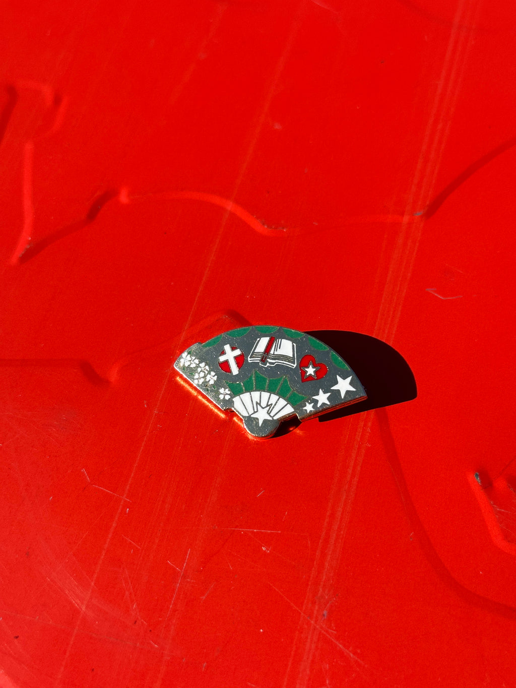 Vintage Cloisonné Fan-Shaped Pin with Cross, Book, and Heart Motifs