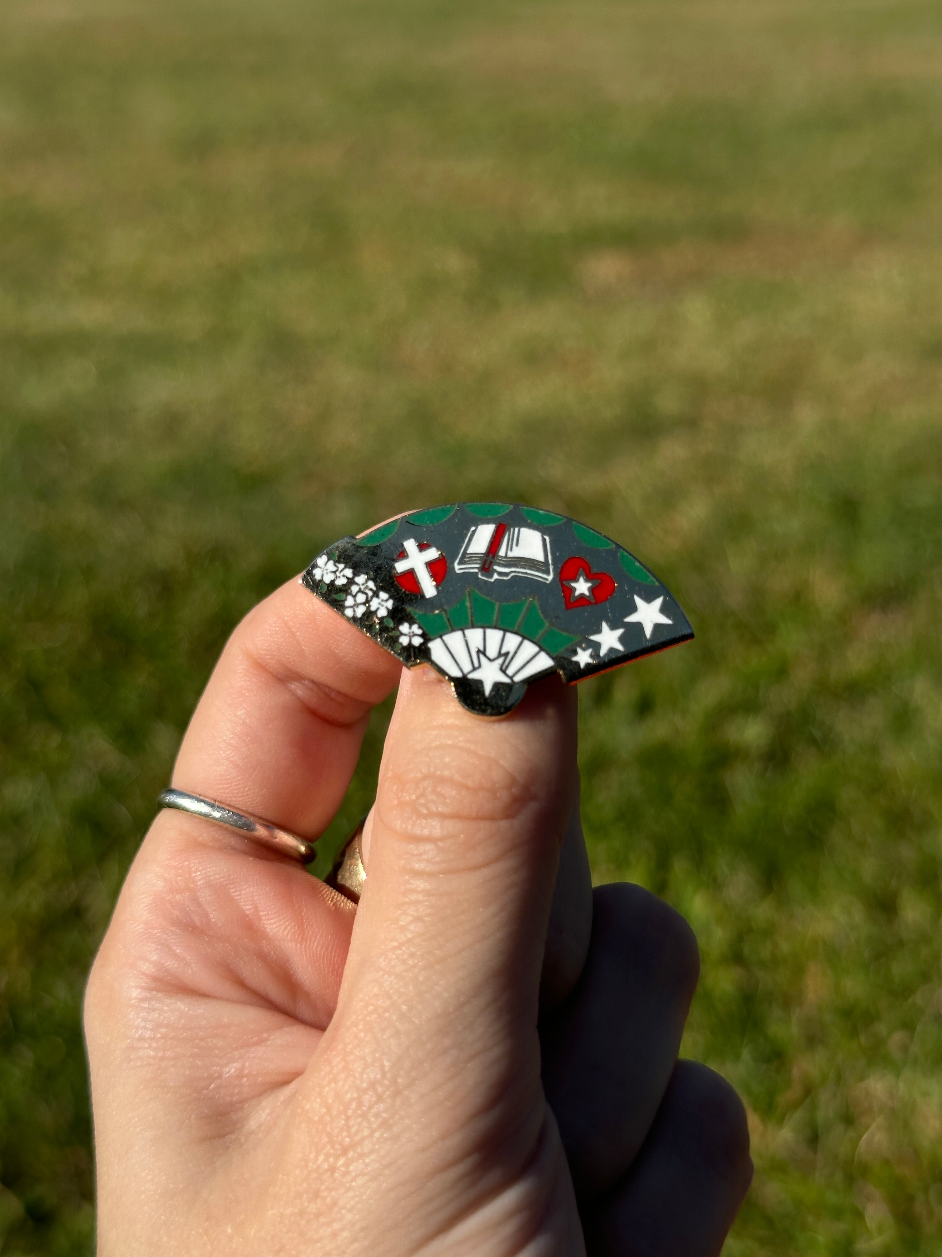 Vintage Cloisonné Fan-Shaped Pin with Cross, Book, and Heart Motifs