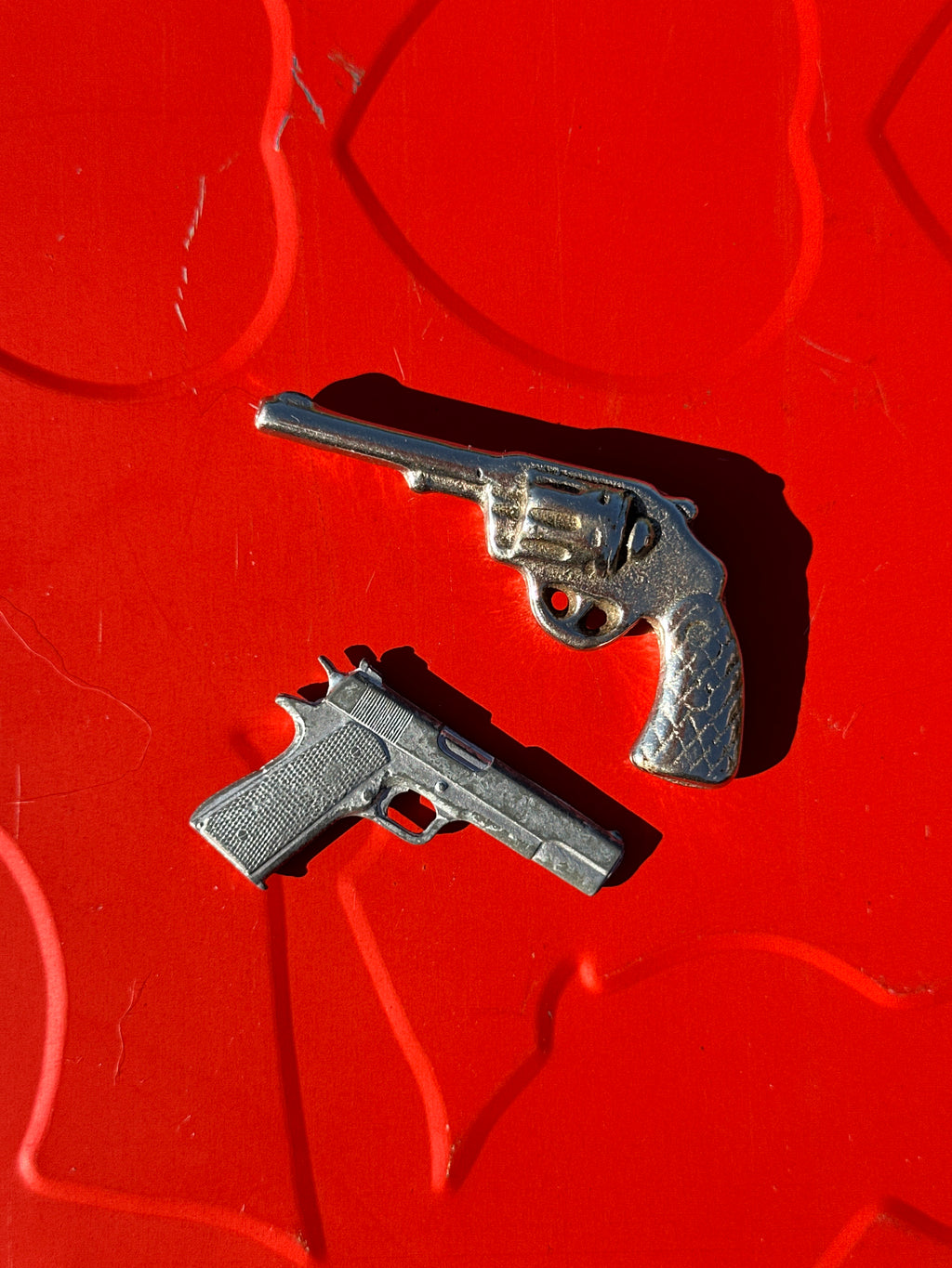 Vintage Mini Gun-Shaped Pins – Revolver and Pistol Pair