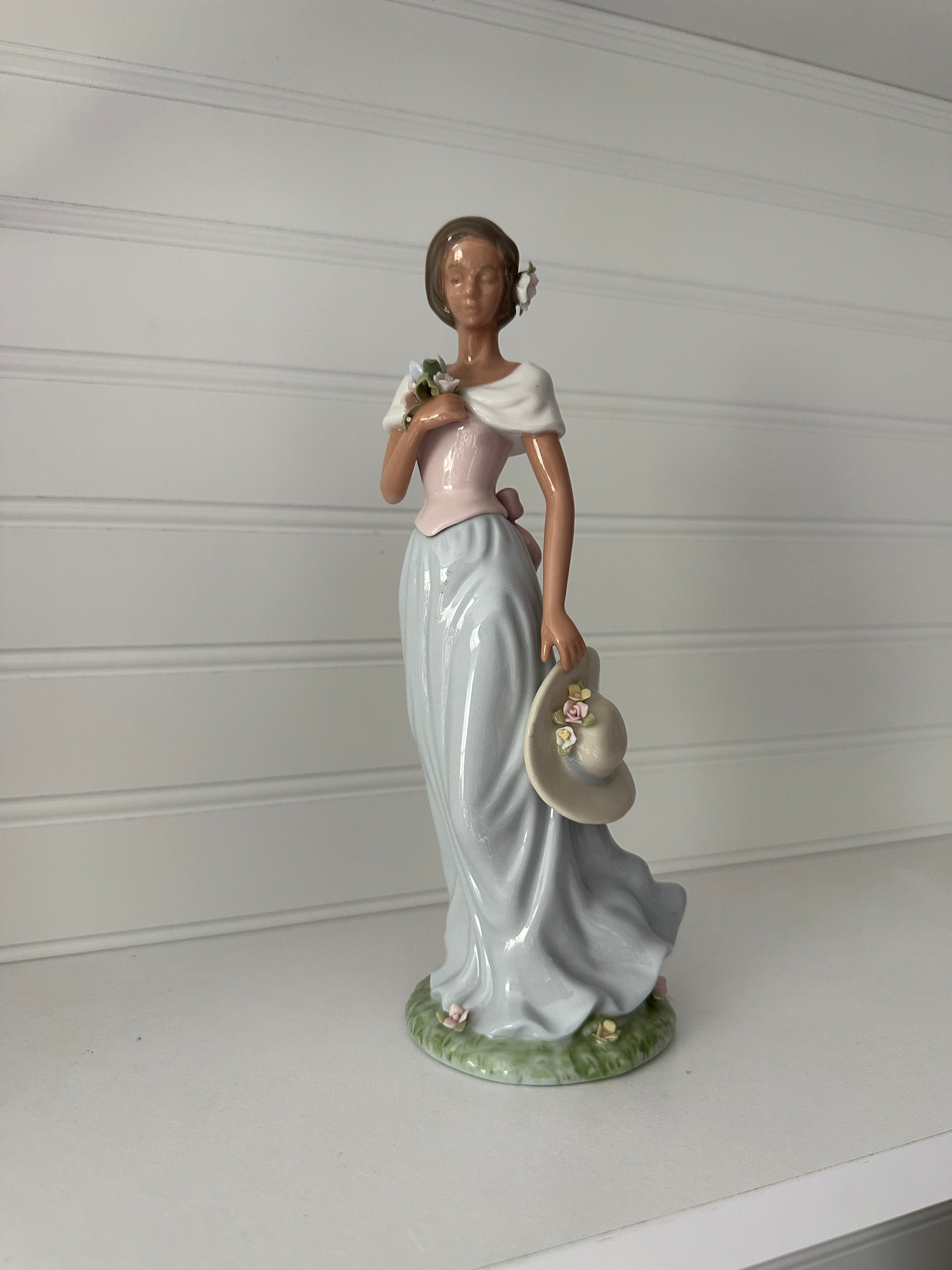 Spring stroll Avon Lady Figurine
