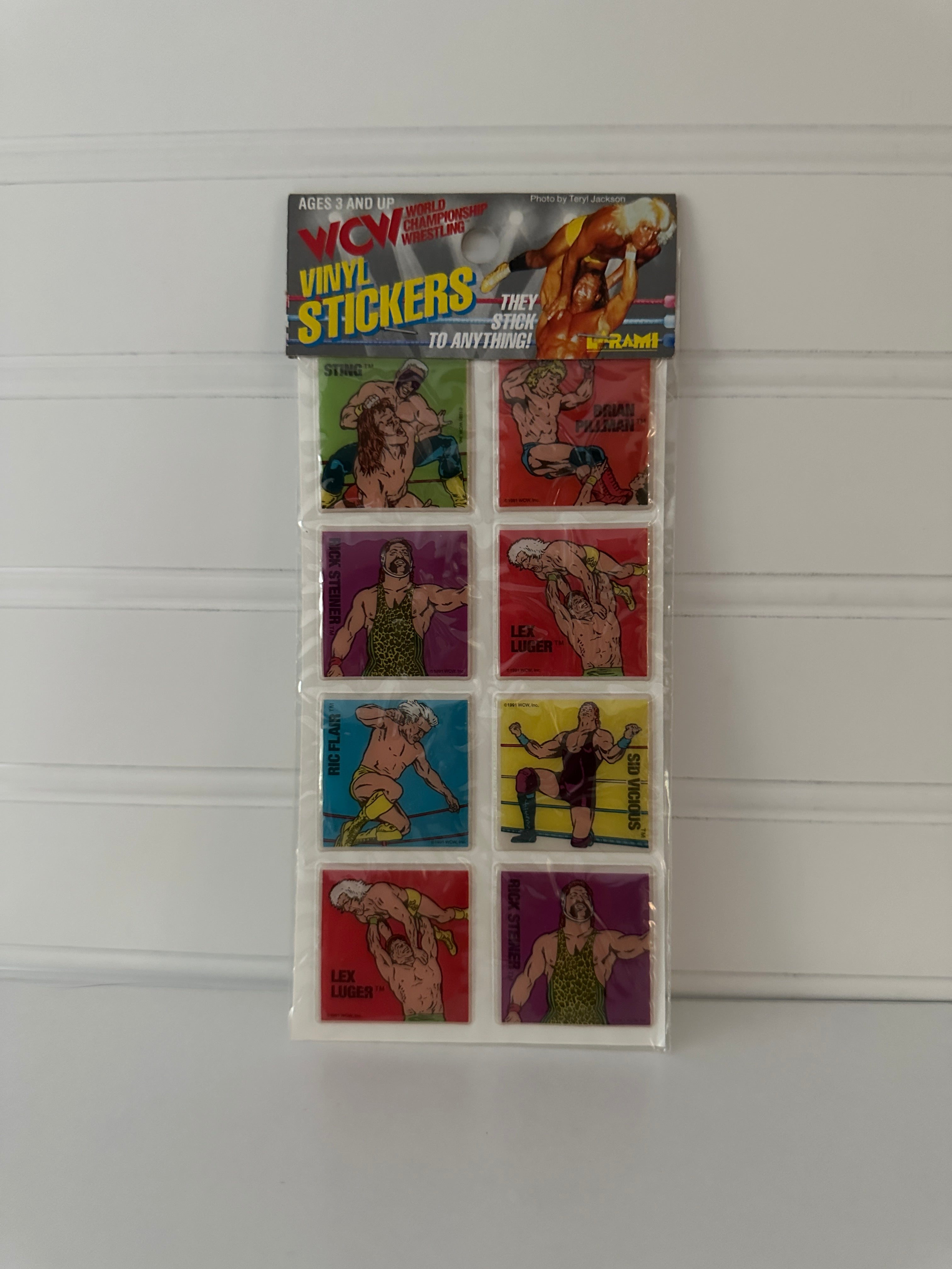 Vintage WCW Vinyl Wrestling Stickers – 8-Pack Featuring Sting, Ric Flair, Lex Luger, and More